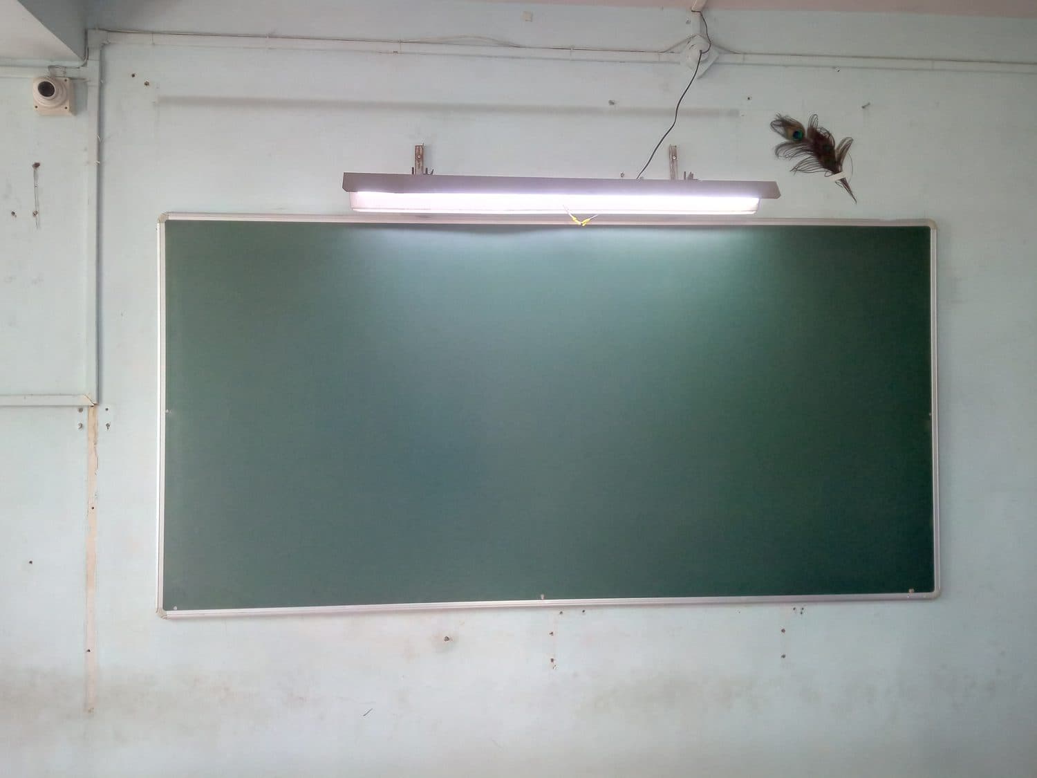 Full-width green chalk board — still in service