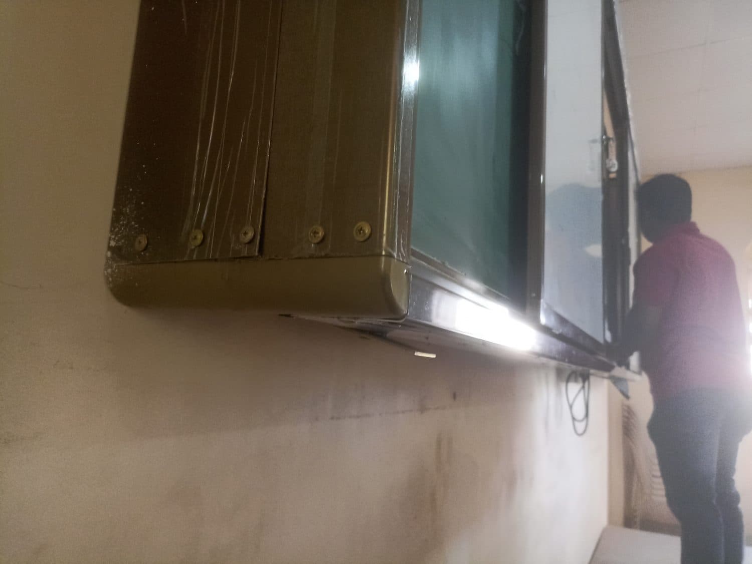 Sliding panels going in around the flat panel